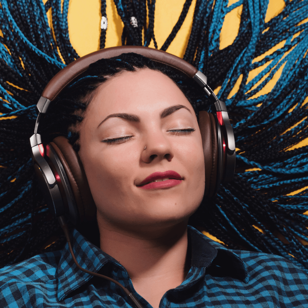 Woman in braids with headphones